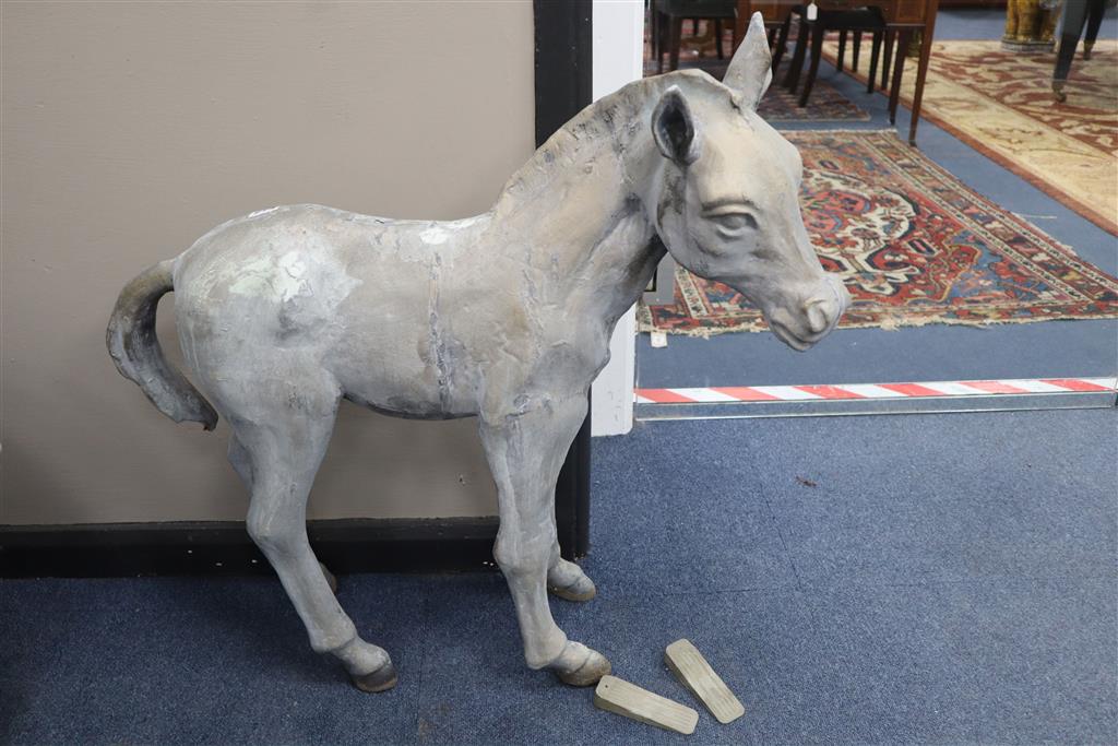 A reconstituted garden ornament of a foal, height 73cm